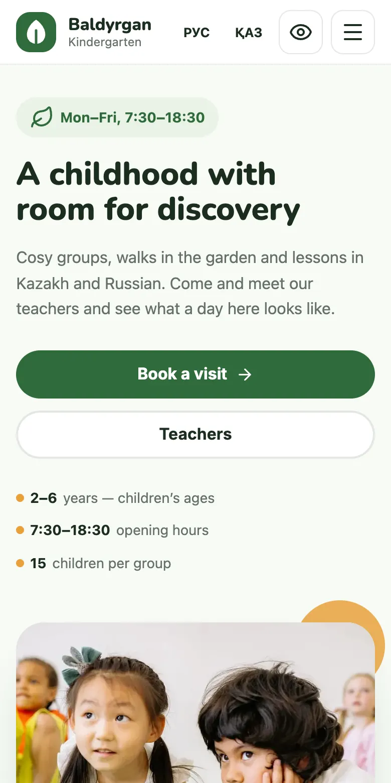 Example kindergarten website in the “Fairy Forest” design on a phone